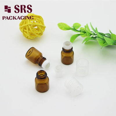 SRS رول شیشه ی زرد خالی 1 میلی لیتر روی بطری عطر با کاپ پلاستیکی شفاف